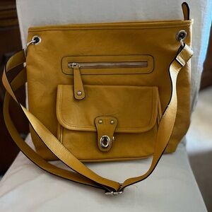 New with tags. Bueno Mustard Yellow Shoulder Bag tote.
Very soft and beautiful.